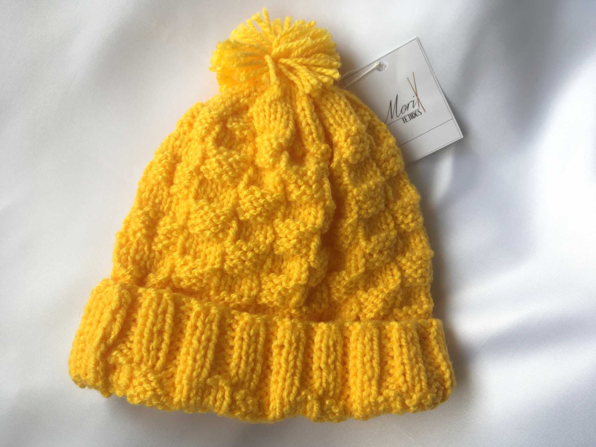 Niño Gorro Amarillo