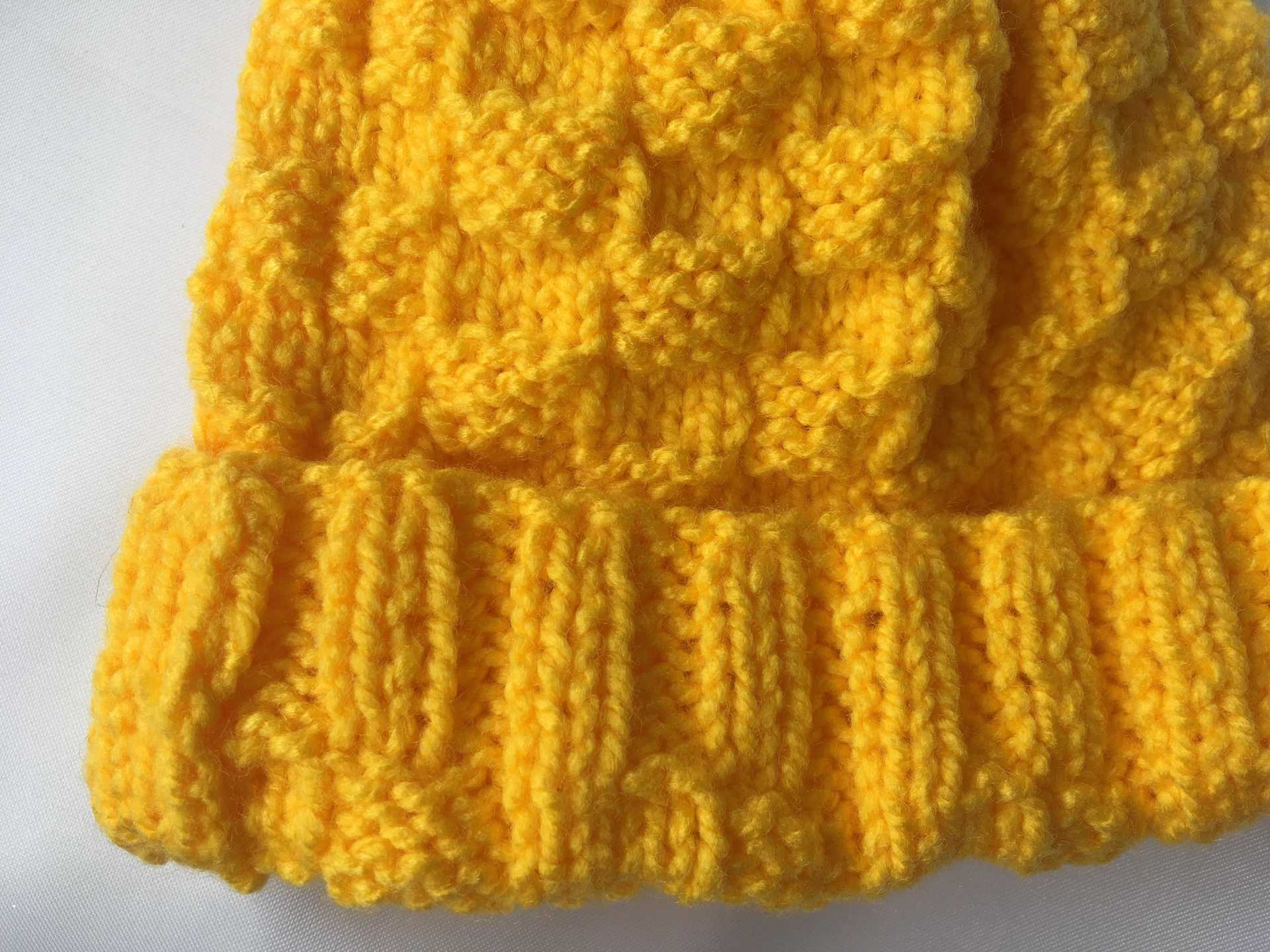 Niño Gorro Amarillo